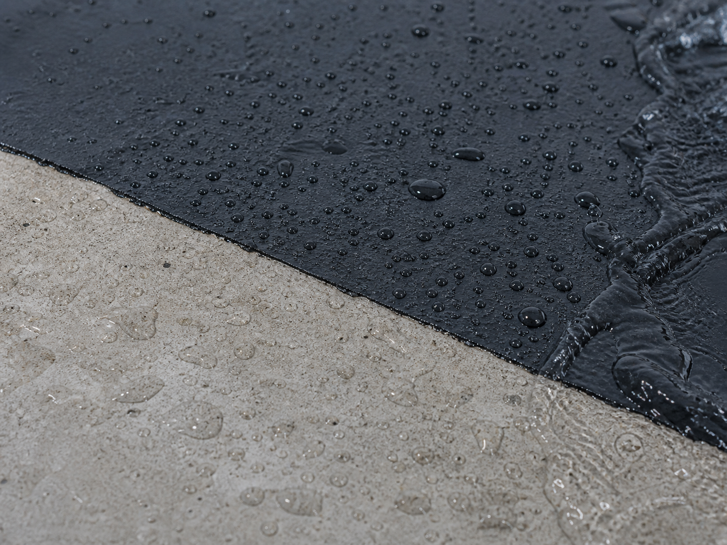 Water beading on a waterproofed construction surface